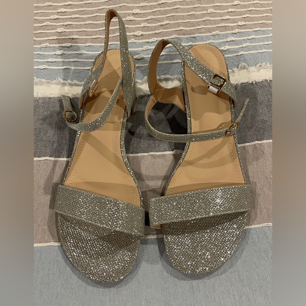 Silver Heels 
Never worn